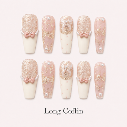 Ribbon Souffle Long Coffin handmade press-on nails with blush French tips, bows and champagne shimmer