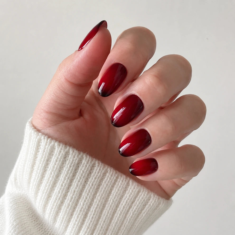 Ruby Lacquer medium almond press-on nails by Matchy Nails