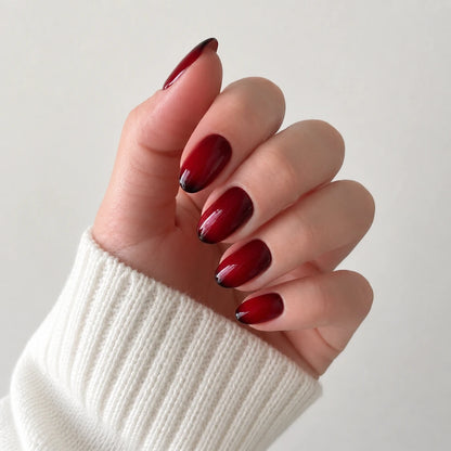 Ruby Lacquer medium almond press-on nails by Matchy Nails