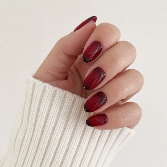 Ruby Lacquer medium almond press-on nails by Matchy Nails