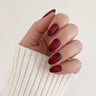 Ruby Lacquer medium almond press-on nails by Matchy Nails
