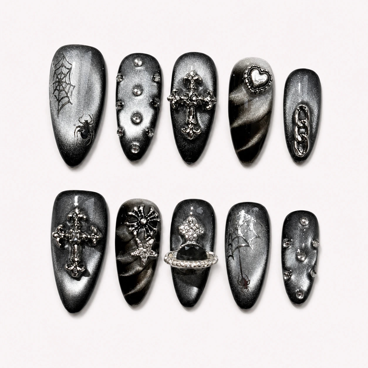 Silver Seance black silver medium almond press-on nails with gothic charms