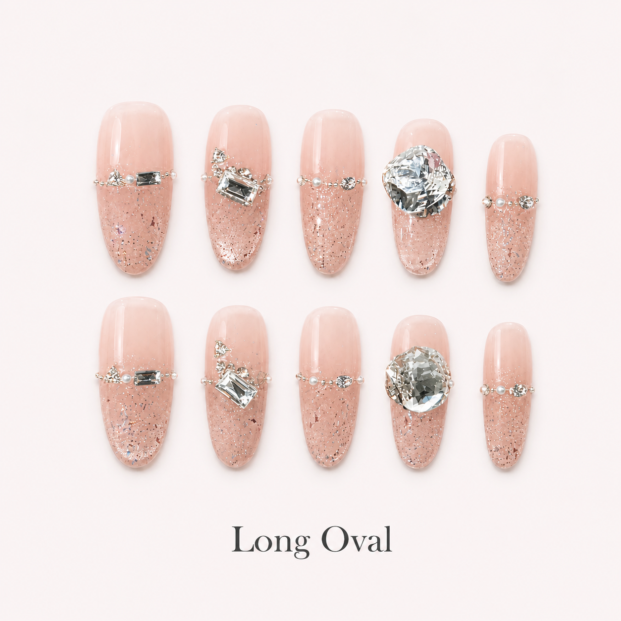 Starlit Blush Long Oval handmade press-on nails with blush glitter and clear crystal accents