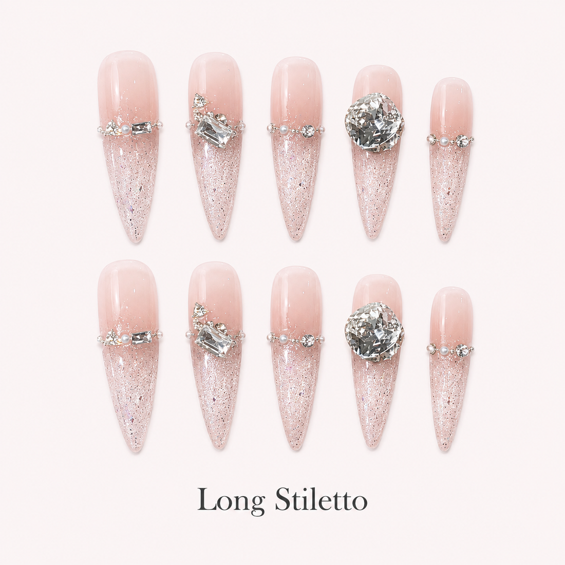 Starlit Blush Long Stiletto handmade press-on nails with blush glitter and clear crystal accents