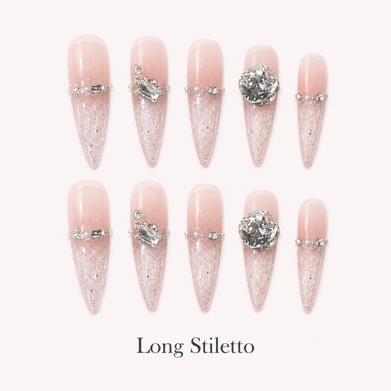 Starlit Blush Long Stiletto handmade press-on nails with blush glitter and clear crystal accents