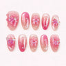 Winglight short almond press-on nails in blush-pink jelly with iridescent butterfly charms
