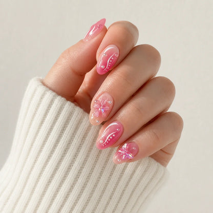 Winglight iridescent butterfly press-on manicure on one softly curled hand